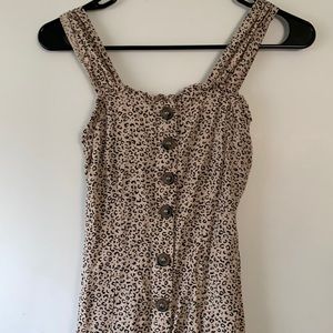 Midi length cheetah print dress.